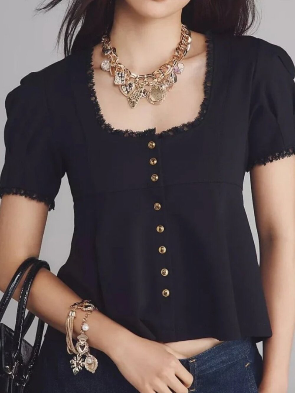 Anthropologie black babydoll top